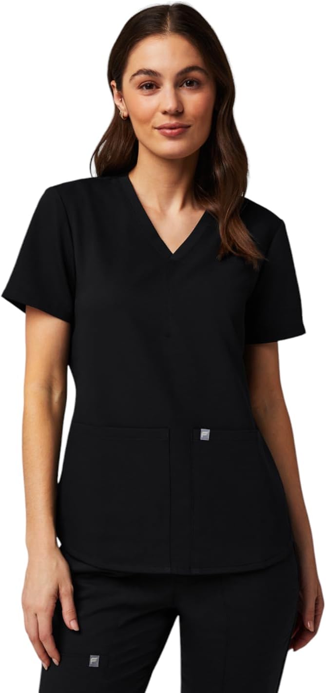 Fabletics women's scrub top in Royal Blue showing v-neck and pocket details